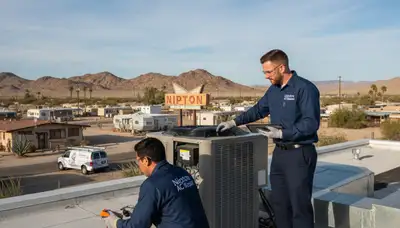 Professional AC repair technician servicing cooling unit in Las Vegas NV home