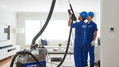 Technician cleaning air ducts for HVAC system in Las Vegas NV home by Five Star Cooling